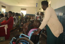 Hydrocephalus cases increase as services lower, medics worry A mother helps her Hydrocephalus conditioned Child during a medical camp at Kitwe Health Centre in October.