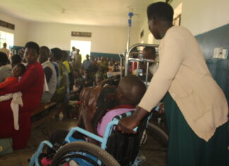 Hydrocephalus cases increase as services lower, medics worry A mother helps her Hydrocephalus conditioned Child during a medical camp at Kitwe Health Centre in October.