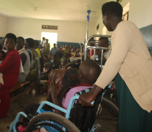 Hydrocephalus cases increase as services lower, medics worry A mother helps her Hydrocephalus conditioned Child during a medical camp at Kitwe Health Centre in October.